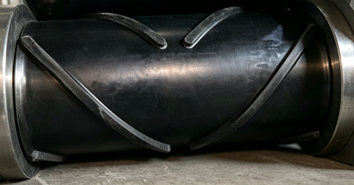 Close-up of anti-slip pattern surface on rubber conveyor belt